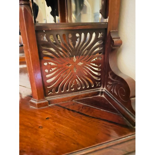 103 - Mahogany corner display cabinet with bevelled glass, 64''h x 24''w, c. 1890