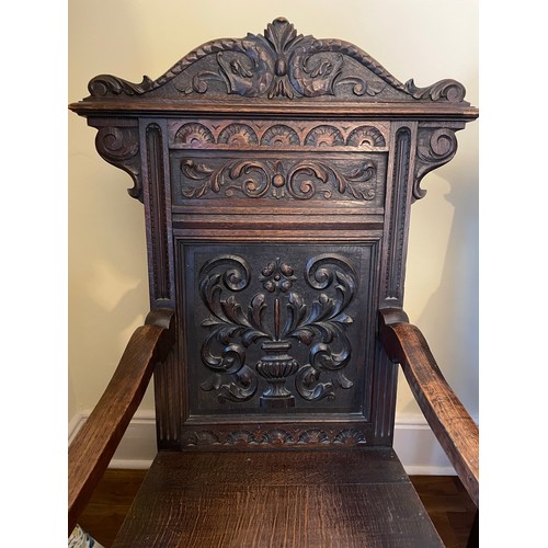 117 - A pair of carved oak wainscot armchairs, circa 1880, 16''seat, 46''overall