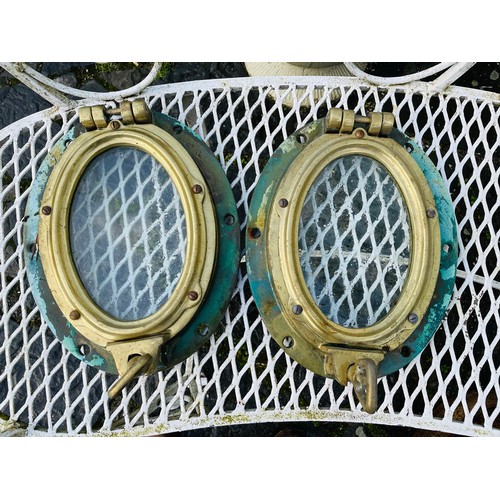 341 - A pair of antique oval brass ships port holes, 10'' x 13''