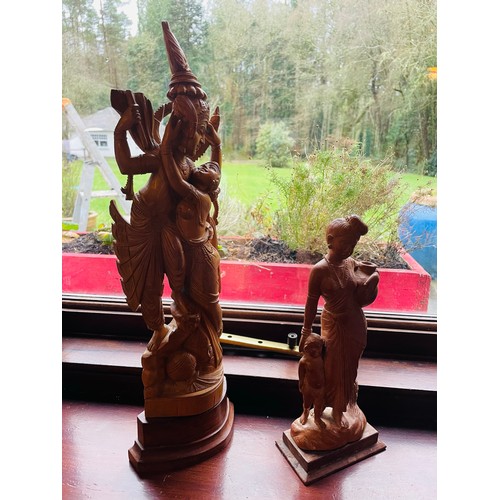 245 - 2 large carved antique Sandalwood figures