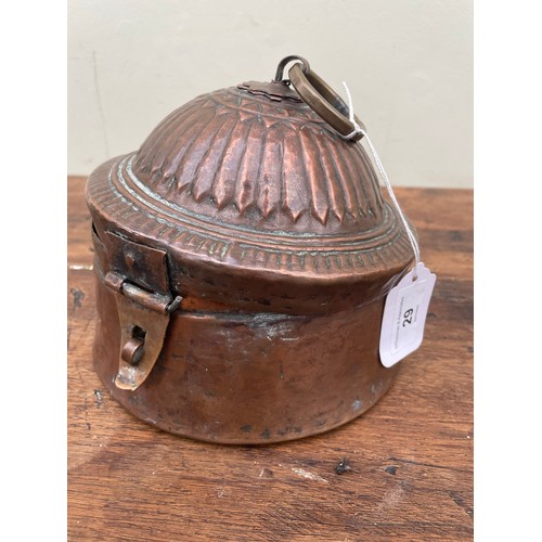 29 - Middle Eastern hand beaten antique copper pot with lid and brass handle, 7''d x 7''h