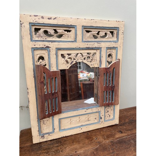 40 - Decorative hand crafted mirror with opening to mirror, 28''h x 23''h