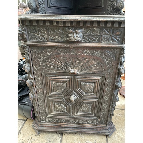 48 - Heavily carved Georgian Irish oak corner cabinet, 72''h x 23''d