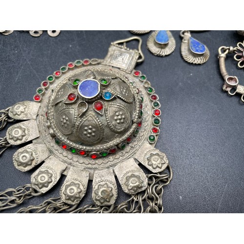 149 - A collection Indian jewelry mounted with lapis and other precious stones