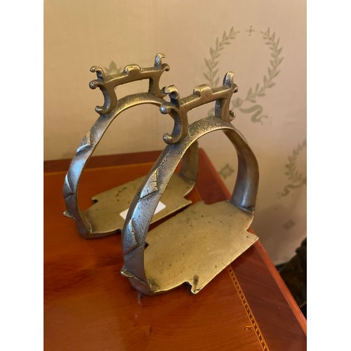 159 - A pair of stirrups/ bookends