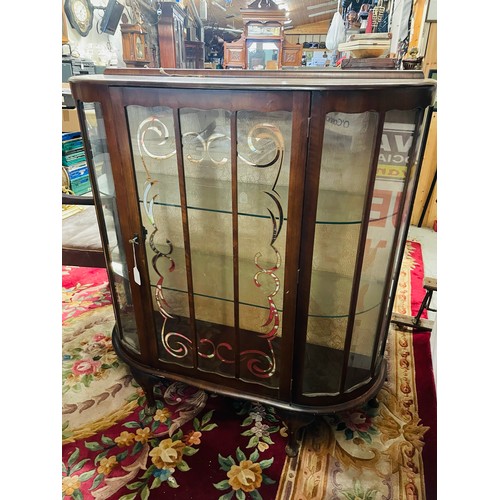 37A - Bow fronted glass cabinet on 4 legs with with 2 glass shelfs, in excellent condition.
40''w x 12''d ... 