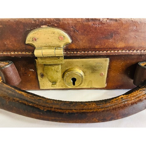 150C - Full length rifle case by Holland and Holland, leather with brass fittings, 4ft L