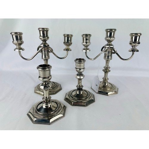 8 - A superb pair of silver plate candelabras (8''h) and a matching pair of candlesticks (5''h)