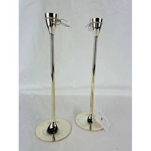 9 - A pair of silver plate candle sticks by Vera Wang/ Wedgwood 10''h