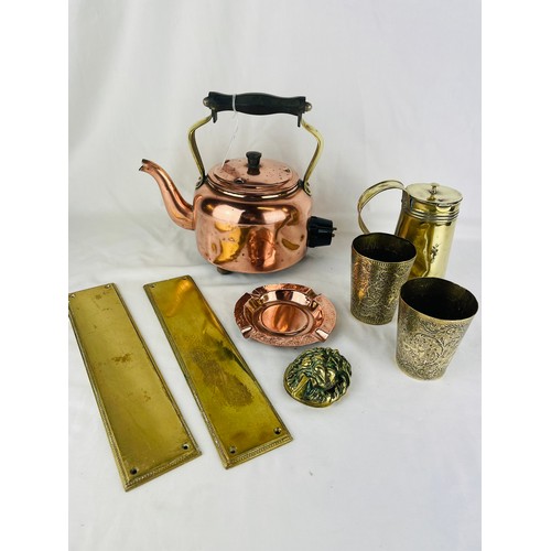 26 - A large collection of copper and brass including a copper kettle