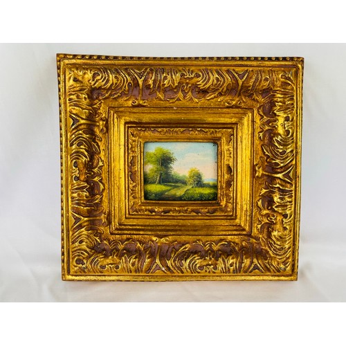 27 - Miniature oil painting in an elaborate gilt frame, 9.5'' x 10''