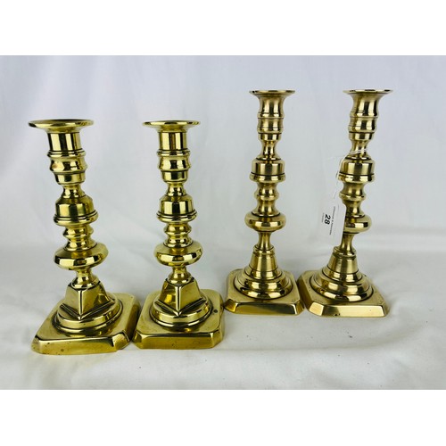 28 - 2 pairs of Victorian brass candlesticks, 9'' and 8.5''