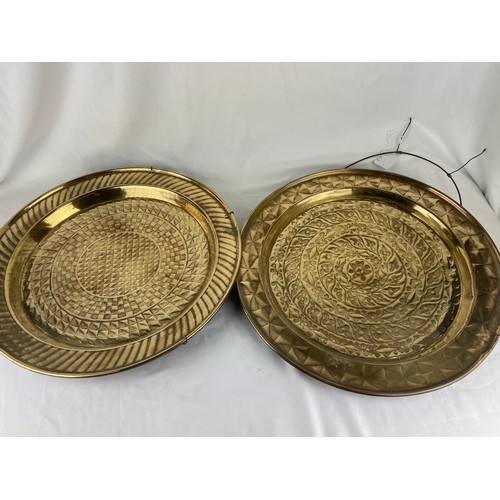 30 - A pair of large brass African plaques, 18''d