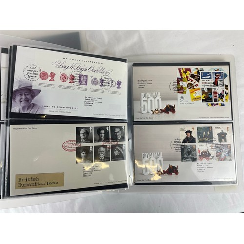 109 - A large collection of Royal Mail first day covers in a specially made folder