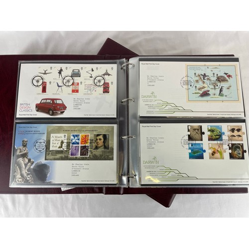 111 - A large collection of Royal Mail first day covers in a specially made deluxe folder