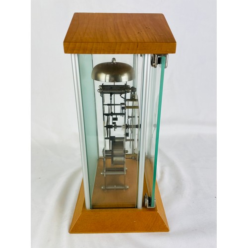 121 - Hermle wind up mantle clock, made in Germany, 12''h x 7.5''w, good working order and has pendulum an... 