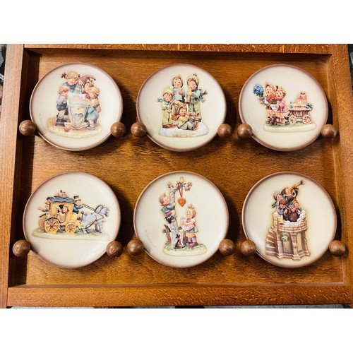 149 - Complete set of 14 Hummel Century Collection plate series with Hummel wall display