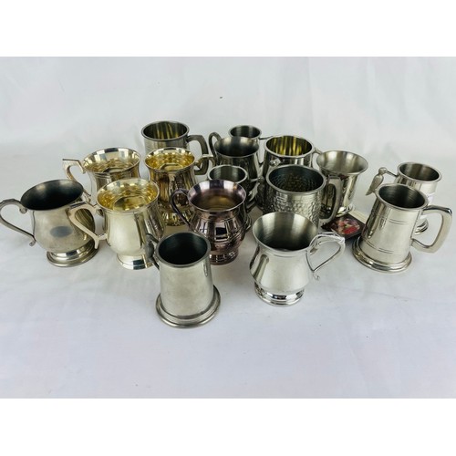 37 - 6 pewter tankards 3'' , 3.5'' and 4''
6 pewter tankards 3.5'' and 4''
4 wood pecker tankards 3.5''