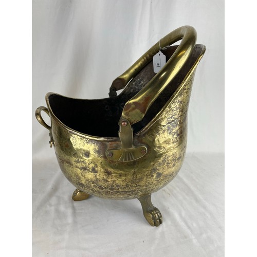 34 - Victorian brass helmet scuttle on 3 legs 16''h x 12''w