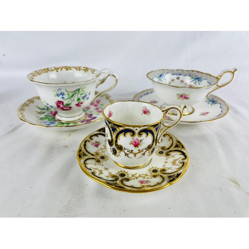 173 - A collection of 3 china cups and saucers