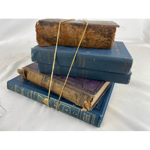 326 - A collection of books including a Bible, King James 1848 and a number of opera and music books