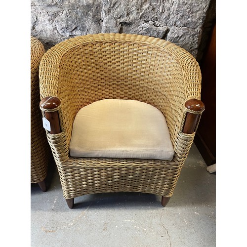 89 - A pair of cane armchairs, seat height 18''