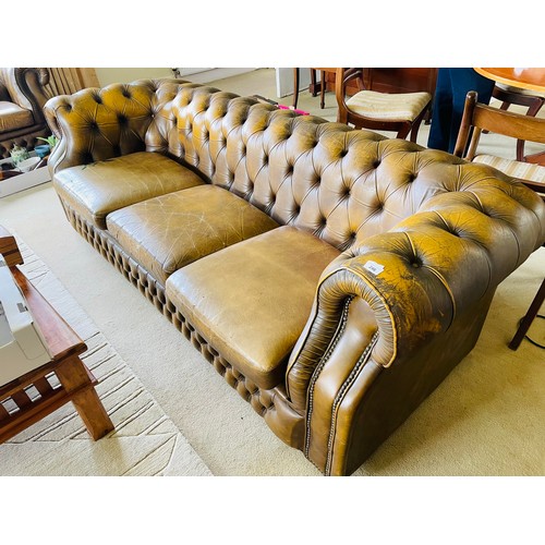 246 - Large brown leather chesterfield sofa and two matching armchairs, sofa 7' l x 34''d  x 16'' seat h. ... 