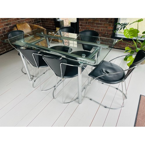 293 - Glass and Chrome dining table and 6 leather and chrome dining chairs, as new condition