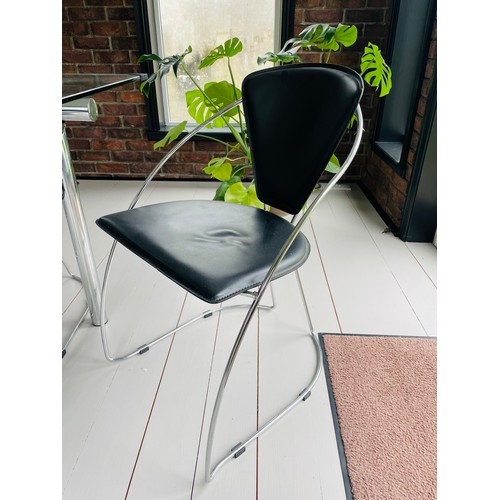 293 - Glass and Chrome dining table and 6 leather and chrome dining chairs, as new condition