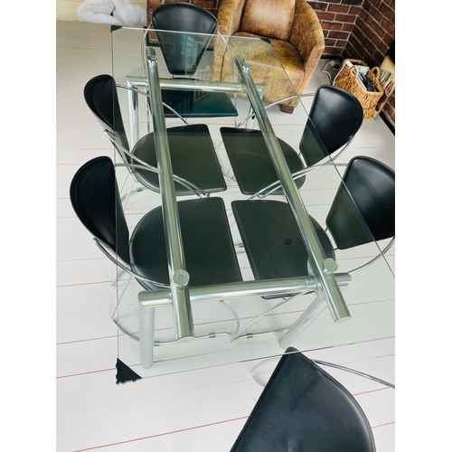 293 - Glass and Chrome dining table and 6 leather and chrome dining chairs, as new condition