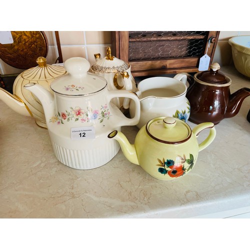 12 - A collection of 5 antique teapots including Sadler and a Carrigaline jug