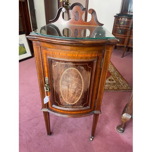 44 - Victorian heavily inlaid single door locker with Sheraton legs on brass castors with fitted glass to... 