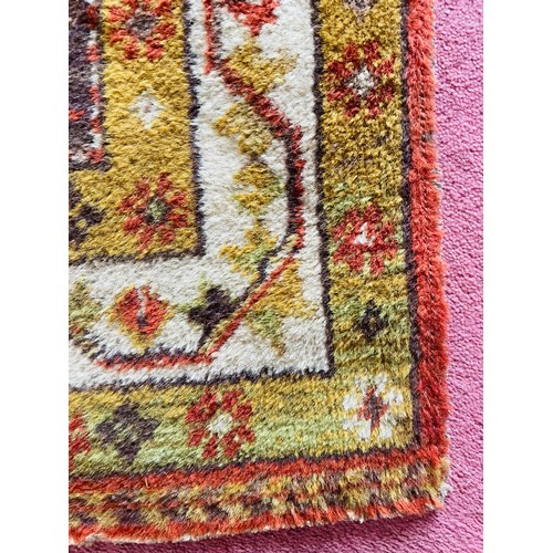 55 - Iranian hand made rug, 62''L x 38''w