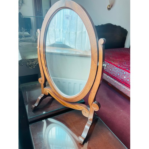 68 - Mahogany oval vanity mirror with swivel , 25''h