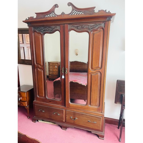 71 - Superb carved oak 2 door wardrobe over 2 drawers complete with original brass hooks and heavily carv... 