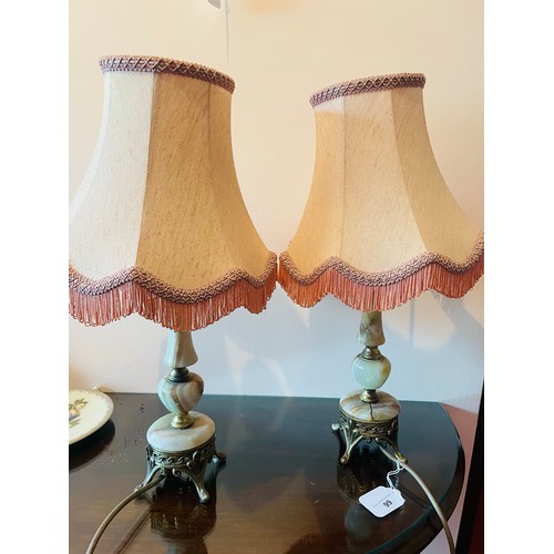 99 - A pair of onyx electric table lamps with shades, 18''h (one as found)