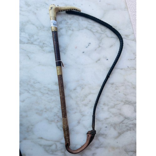 107 - Victorian bone handle horse riding crop/ whip with leather strap,