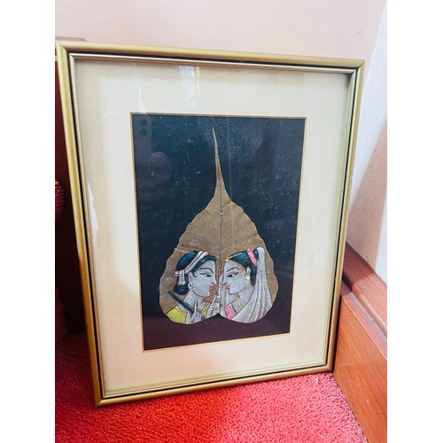 111 - A pair of Indian silks, framed , 12'' x 9.5''