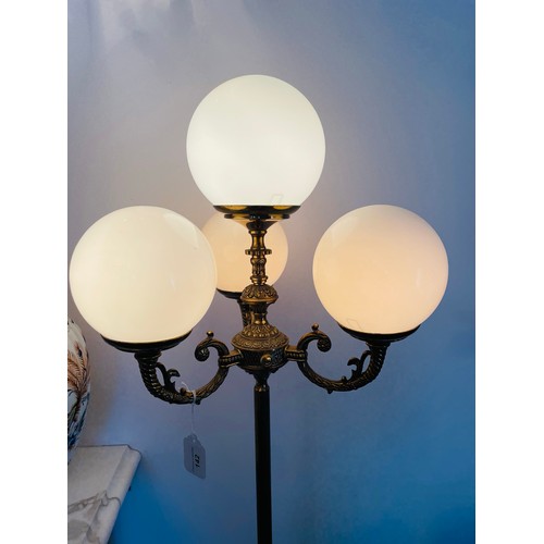 142 - A superb 4 bowl tall brass lamp, 65''h, very heavy and excellent quality.