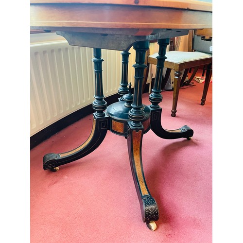 188 - Superb inlaid oval dining table with tilt top on and exquisitely crafted pod on castors, 27''h x 40'... 