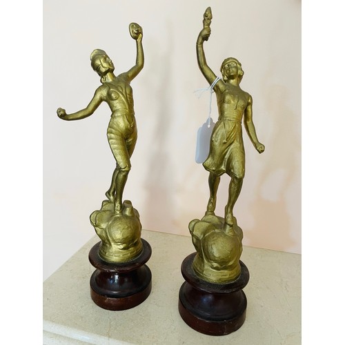 206 - A pair of Art Deco metal figures in gilt, 13''h