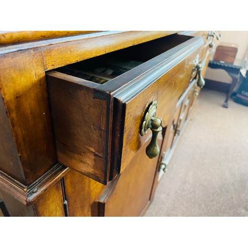 218 - Superb art Deco oak sideboard with tear drop brass handles and beveled glass mirrors, with three dra... 