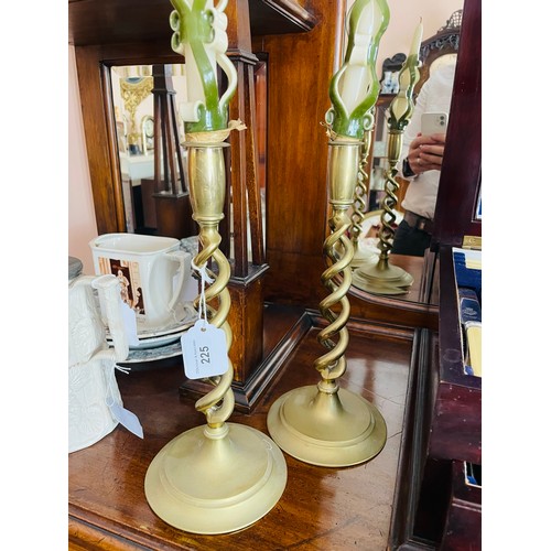 225 - A pair of tall barley twist heavy brass candle sticks, 12''h