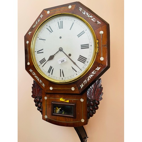 229 - Superb mother of pearl oak cased 8 day wall clock complete with key and pendelum, with carved bunch ... 