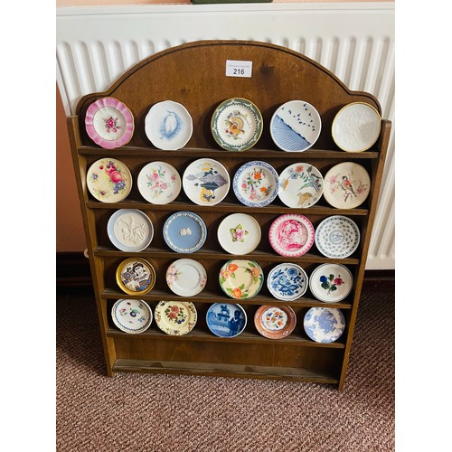 216 - A collection of miniature plaques and stand, (26)
Each plate has it’s own authentication booklet. Co... 