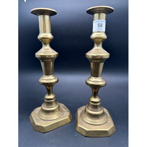 58 - Victorian pair of brass candle sticks with pushers