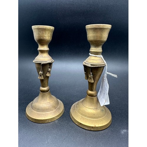 59 - Pair of brass candle sticks with rope decoration, 6.5 ''h