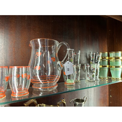 60 - A collection of hand painted glasses and a jug (10 glasses)