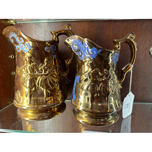 61 - 2 Victorian Lustre jugs