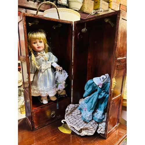 93 - Vintage porcelain doll in timber box that is also a wardrobe 17.5''h